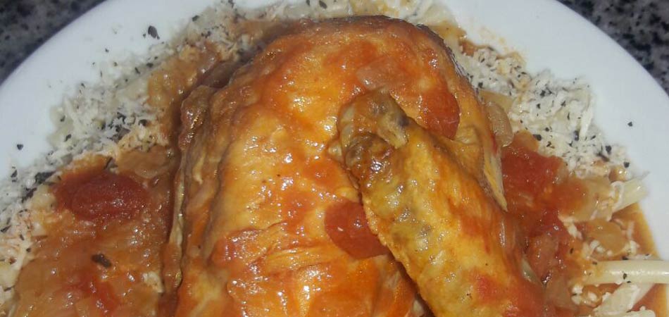 Chicken in a delicious sauce served with rice 