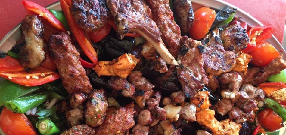 A huge platter piled high with meats