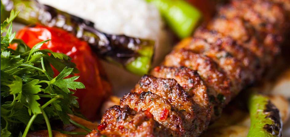 Spicy Adana kebab served with all the trimmings