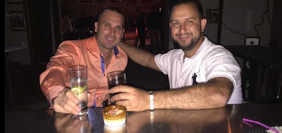 Two friends drinking together