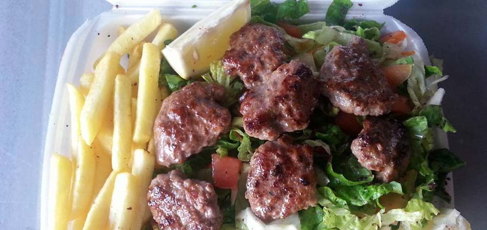 Meatballs in takeaway packet ready to be delivered