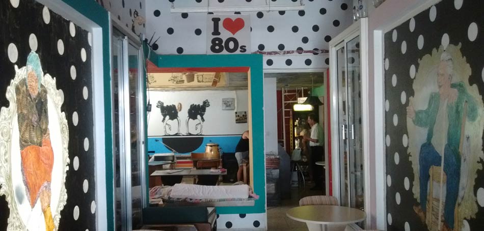 The funky design with rainbow ceiling and vintage objects